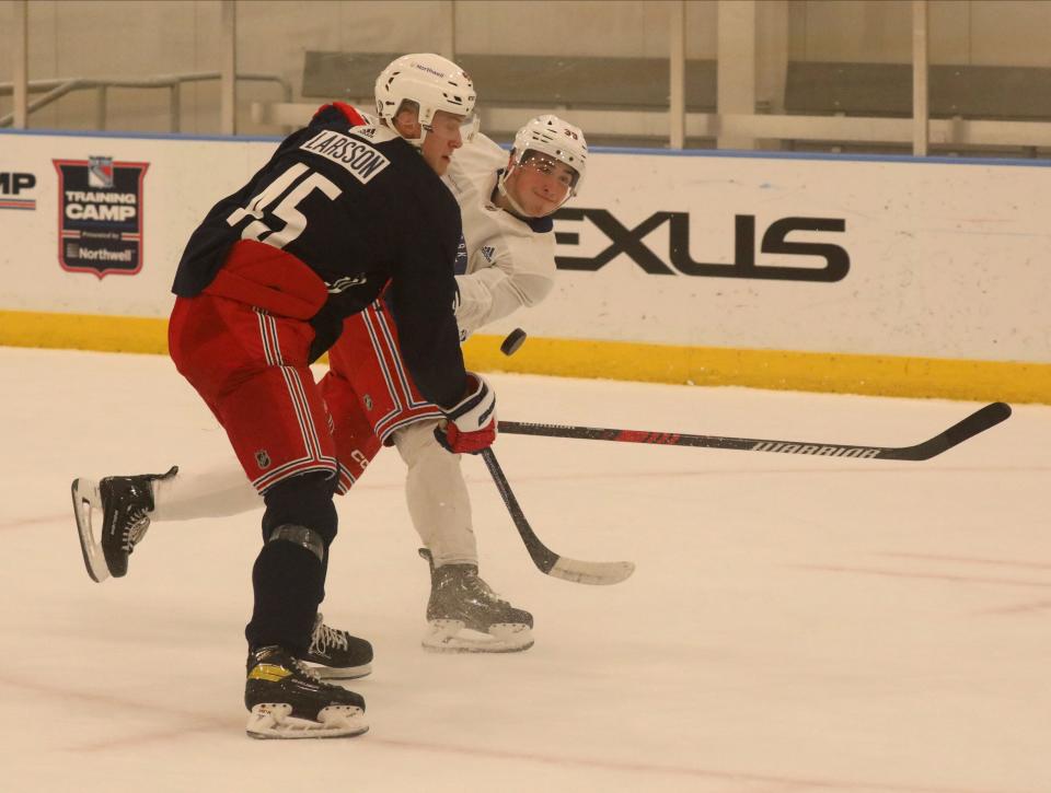 Drew Fortescue, right, and Rasmus Larsson in action during the New York Rangers development camp at their training center in Tarrytown, July 5, 2023. 