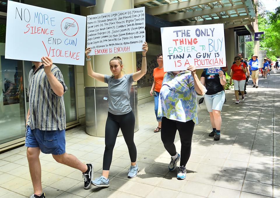 Supporters for gun control marched in downtown Greenville on June 11, 2022.