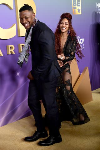 <p>Unique Nicole/WireImage</p> Meagan Good and Jonathan Majors attend the NAACP Image Awards on March 16, 2024