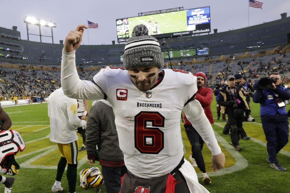 Tampa Bay Buccaneers quarterback Baker Mayfield (6) runs off the field after an NFL football game against the Green Bay Packers, Sunday, Dec. 17, 2023, in Green Bay, Wis. The Buccaneers won 34-20. (AP Photo/Mike Roemer)