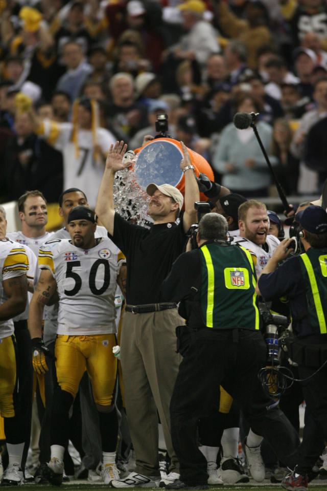 Denver Broncos Head Coach Gary Kubiak is doused with Gatorade by