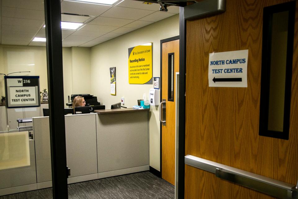 Carla Lyons, exam coordinator at the North Campus Test Center, works at her desk, Wednesday, June 22, 2022, in the Chemistry Building on the University of Iowa campus in Iowa City, Iowa.