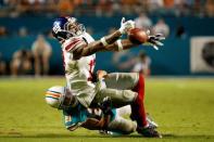 Dec 14, 2015; Miami Gardens, FL, USA; New York Giants wide receiver Odell Beckham Jr. (13) is unable to make a catch as Miami Dolphins cornerback Brent Grimes (21) defends during the second half at Sun Life Stadium. Mandatory Credit: Steve Mitchell-USA TODAY Sports