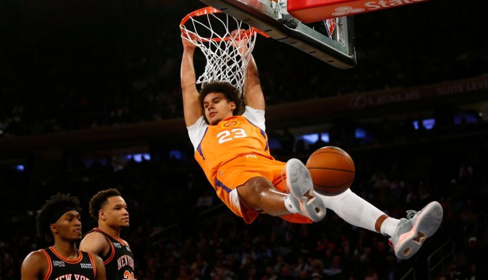 Cam Johnson dunks for Phoenix (John Munson/AP) (AP)