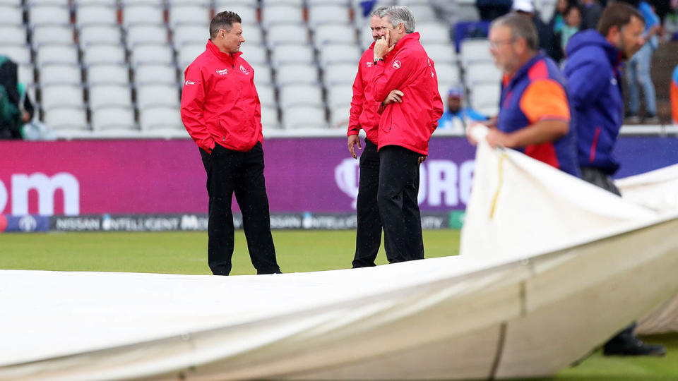 Umpires during an inspection as rain stops play. (Photo by David Davies/PA Images via Getty Images)