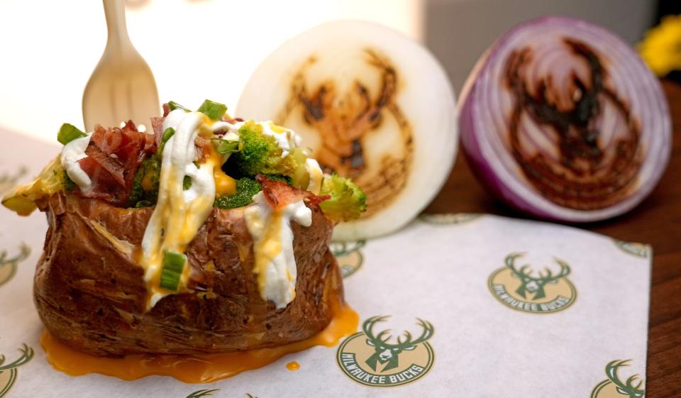 A loaded baked potato is shown during a media preview highlighting food and beverage updates at Milwaukee Bucks games Wednesday at Fiserv Forum.