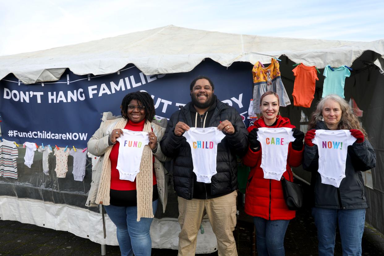 Parents, advocates and caregivers gather to bring attention to the projected budget shortfall for Oregon's Employment Related Daycare program on Thursday. More than 1,300 families are on a waitlist for the program.