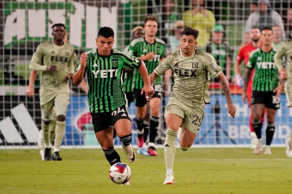 Austin FC defender Nick Lima dribbles against Los Angeles FC forward Cristian Olivera during the second half of their Oct. 7 match at Q2 Stadium. El Tree is out of the playoff picture and already looking at 2024.