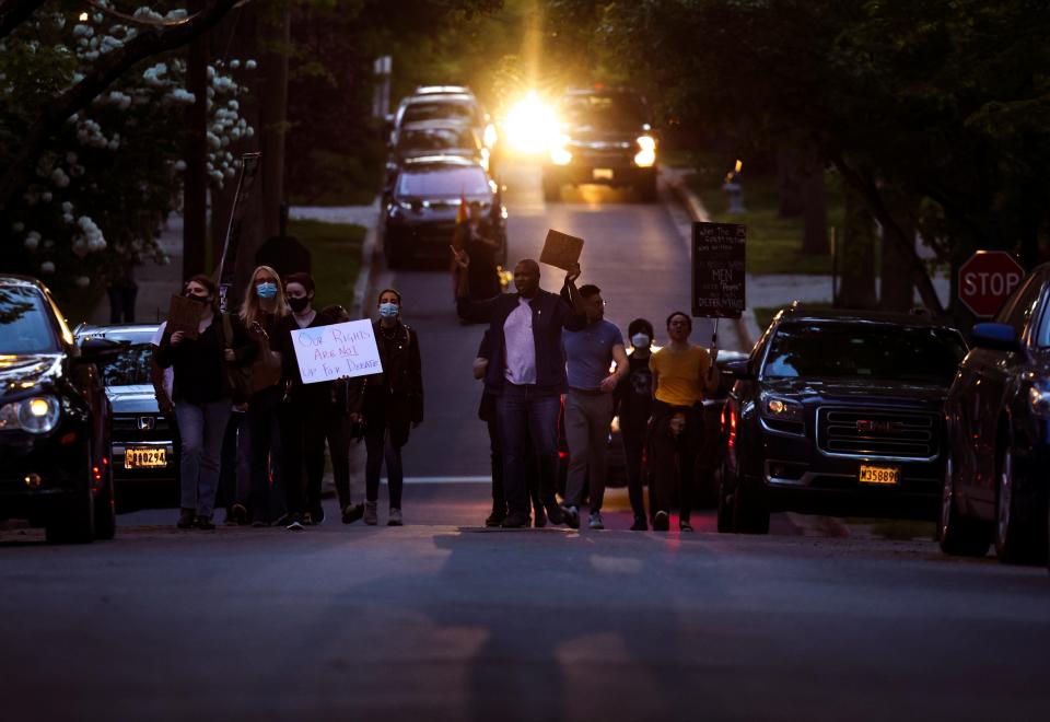 Abortion-rights advocates stage a protest outside the home of Associate Justice Brett Kavanaugh on May 11, 2022, in Chevy Chase, Maryland.