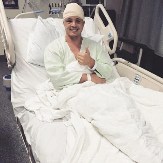 Johnny pictured in August 2017 recovering in hospital after undergoing emergency surgery to remove a brain tumour