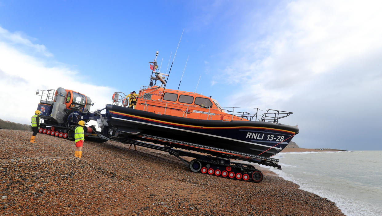 The Hastings Shannon Class lifeboat heads out to sea during a training exercise in Hastings, East Sussex.