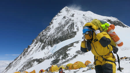A porter carries goods at camp four at Everest, in this picture taken on May 20, 2016. Phurba Tenjing Sherpa/Handout via REUTERS