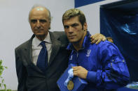 AVEZZANO, ITALY - JULY 02: Gold medalist Clemente Russo of Italy and Mario Pescante of Italy after the medal ceremony Men's Heavy 91kg final on day 6 during the XVI Mediterranean Games at the Sports Hall Pala Ghiaccio on July 2, 2009 in Avezzano, Italy. (Photo by Getty Images/Getty Images)