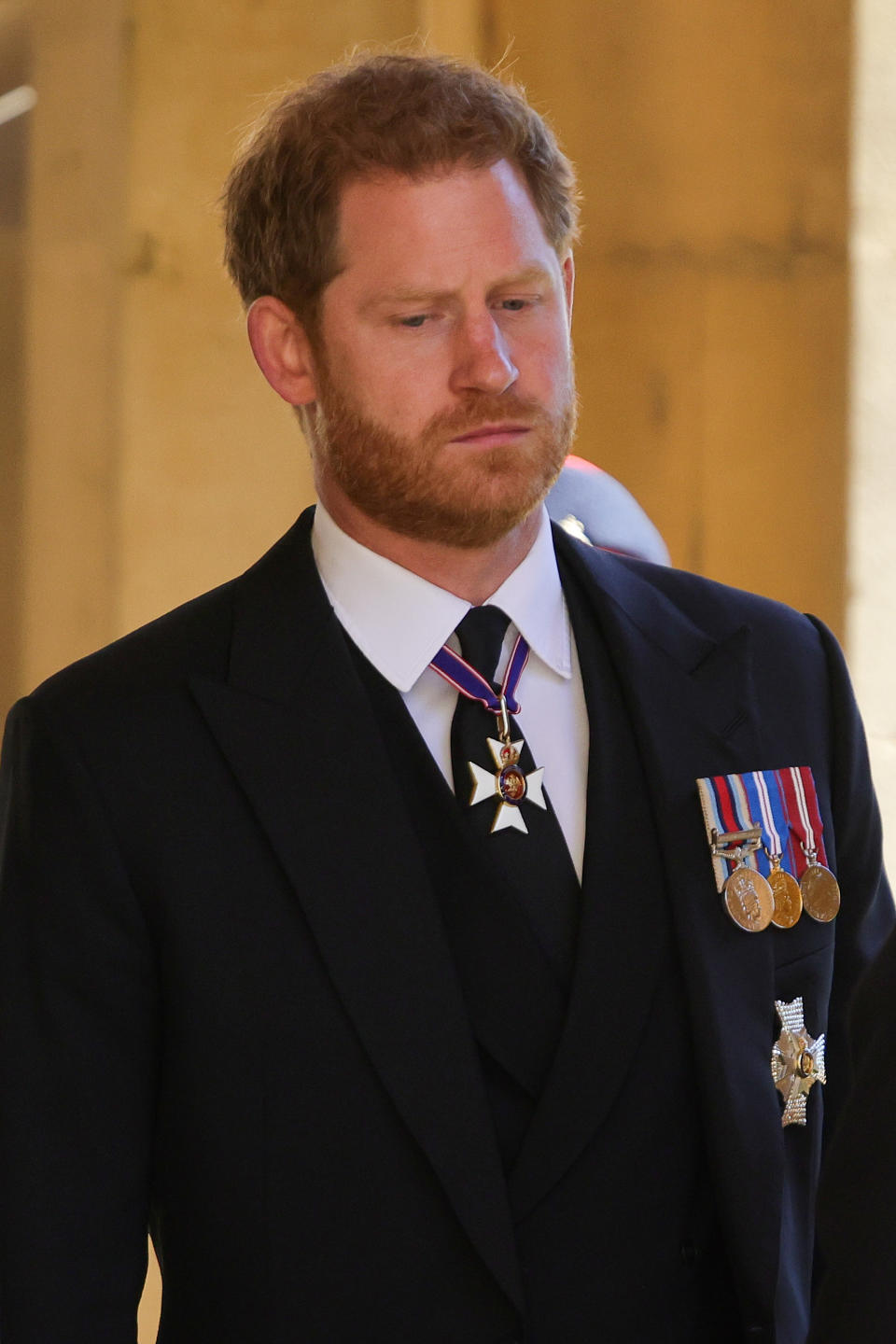 WINDSOR, ENGLAND - APRIL 17: Prince Harry, Duke of Sussex  during the Ceremonial Procession during the funeral of Prince Philip, Duke of Edinburgh at Windsor Castle on April 17, 2021 in Windsor, England. Prince Philip of Greece and Denmark was born 10 June 1921, in Greece. He served in the British Royal Navy and fought in WWII. He married the then Princess Elizabeth on 20 November 1947 and was created Duke of Edinburgh, Earl of Merioneth, and Baron Greenwich by King VI. He served as Prince Consort to Queen Elizabeth II until his death on April 9 2021, months short of his 100th birthday. His funeral takes place today at Windsor Castle with only 30 guests invited due to Coronavirus pandemic restrictions. (Photo by Chris Jackson/WPA Pool/Getty Images)