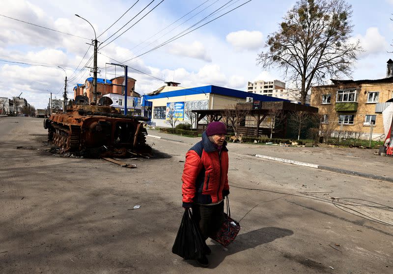 The Wider Image: Behind enemy lines, Ukrainian woman survives with her chickens