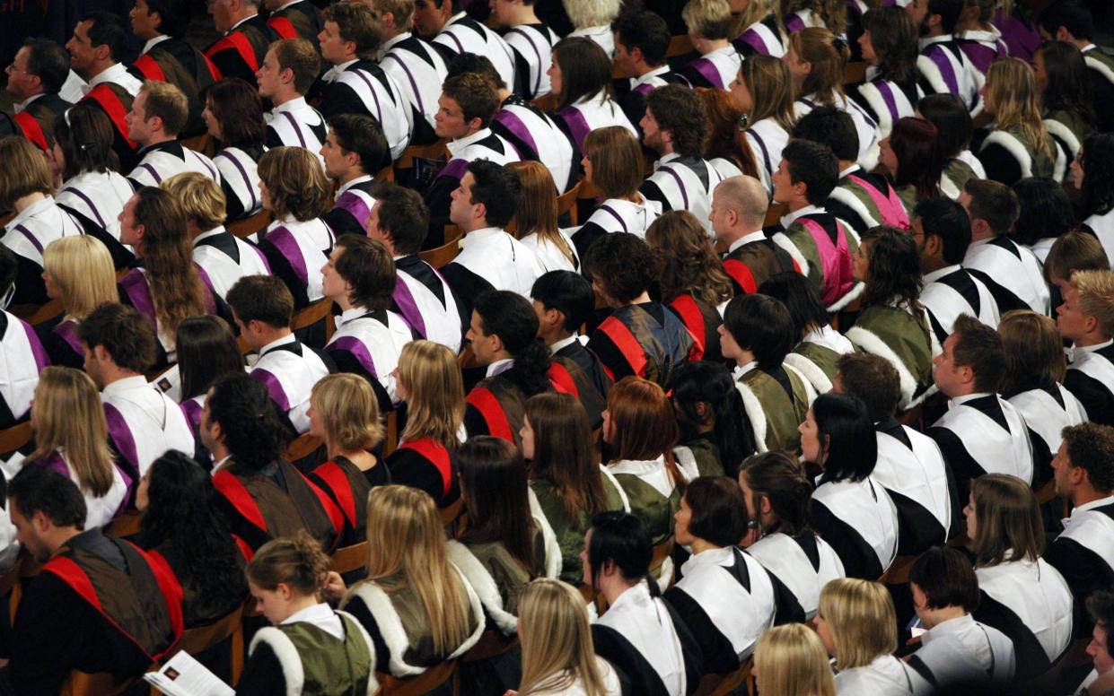 Students at a university graduation ceremony - David Cheskin/PA Wire