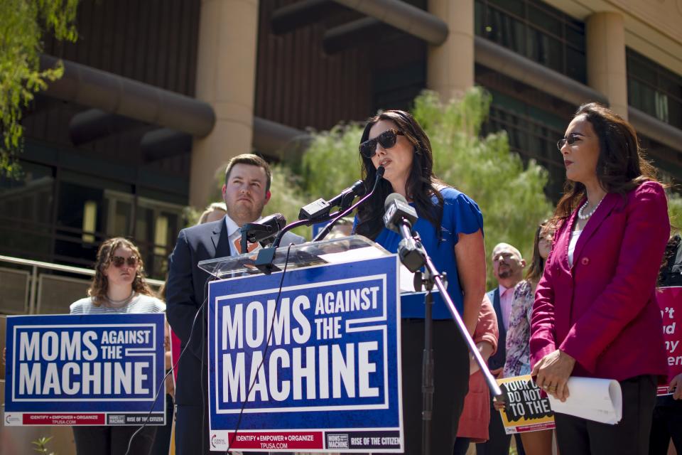 Amanda Wray, the main plaintiff in a lawsuit against the Scottsdale Unified School District, speaks during a news conference outside the Arizona Superior Court building in Phoenix on May 5, 2022.