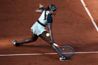 Sloane Stephens of the U.S. returns the ball to France's Diane Parry during their third round match of the French Open tennis tournament at the Roland Garros stadium Friday, May 27, 2022 in Paris. (AP Photo/Thibault Camus)