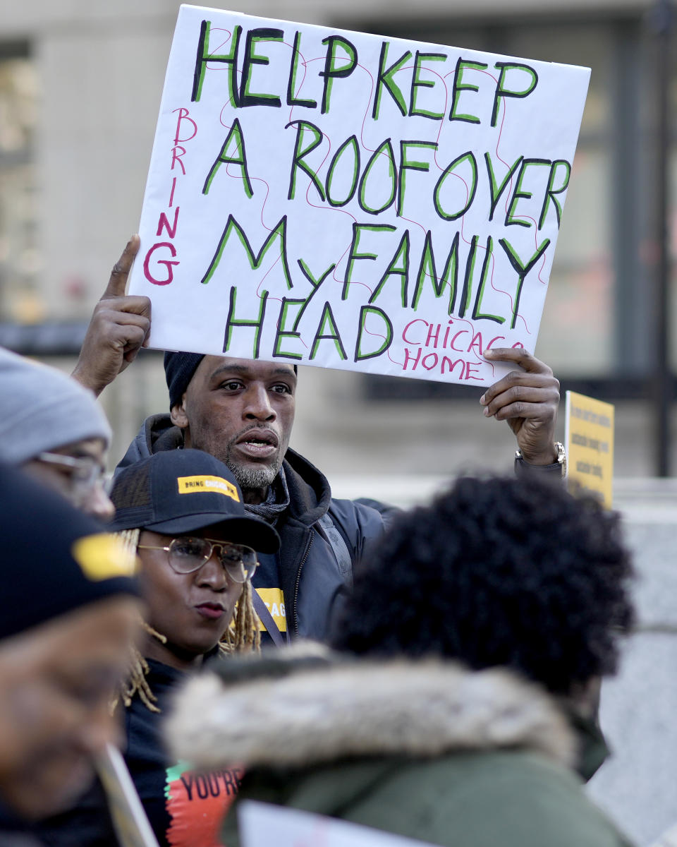 Brian Rodgers participates in a rally prior to a court hearing Wednesday, Feb. 14, 2024, on a Chicago ballot measure that would raise a one-time tax on luxury properties to fund services for homeless people in Chicago. A Cook County judge rejected the ballot measure last week after objections from real estate and business groups. An appeal is pending as early voting begins. (AP Photo/Charles Rex Arbogast)