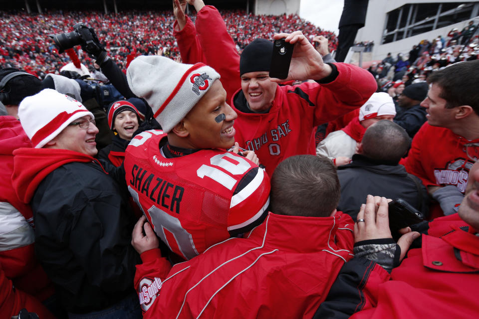 Ryan Shazier (10), pictured in the middle of a celebration after beating Michigan in 2012, played three years at Ohio State before the Steelers drafted him with the 15th overall pick in 2014. (Getty Images) 