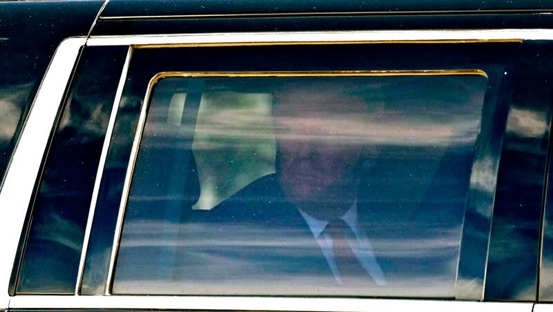Former President Donald Trump waves to supporters as he leaves federal court, Thursday, March 14, 2024, in Fort Pierce, Fla.