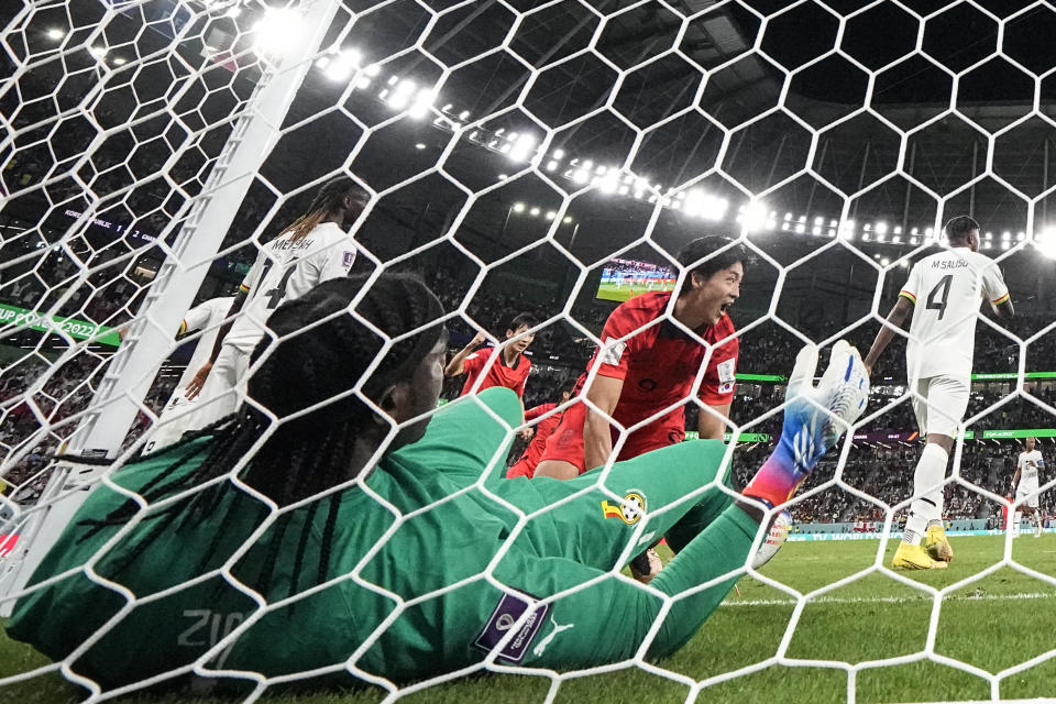 South Korea's Cho Gue-sung celebrates scoring during the World Cup group H soccer match between South Korea and Ghana, at the Education City Stadium in Al Rayyan , Qatar, Monday, Nov. 28, 2022. (AP Photo/Julio Cortez)