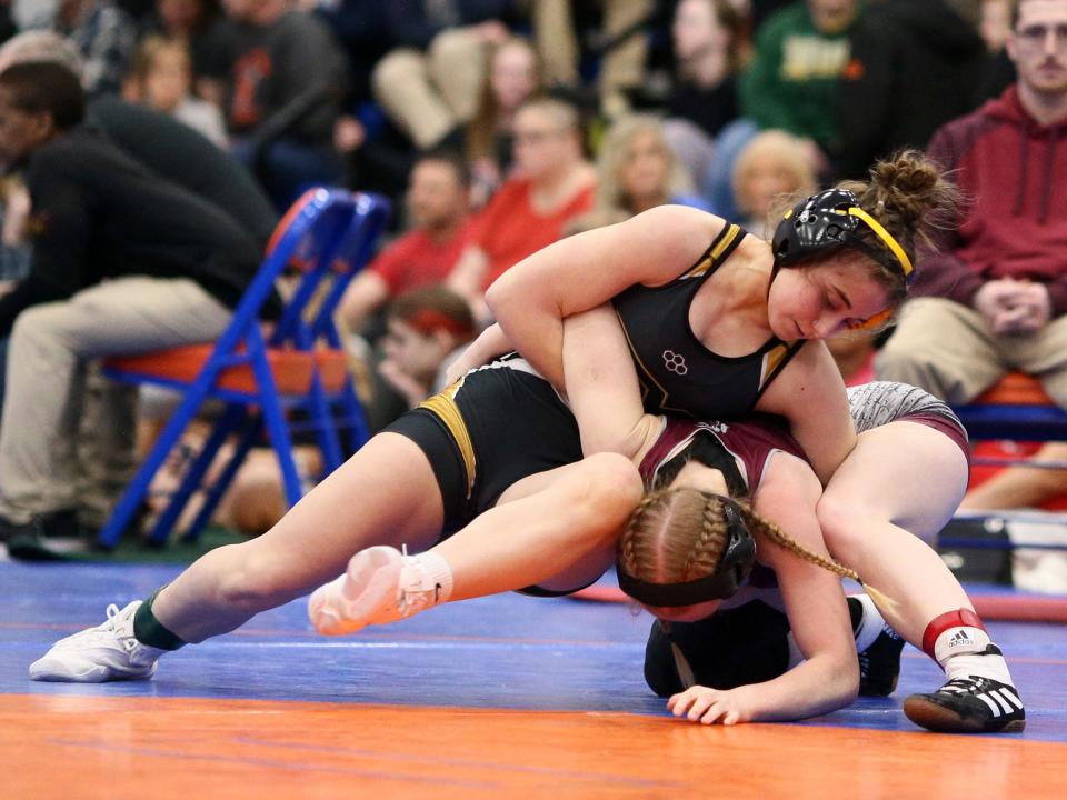 Tri-Valley's Kandice Spry wrestles Vinton County's Parker Mock in the 115-pound class during the girls regional tournament at Olentangy Orange on Sunday, March 3, 2024.