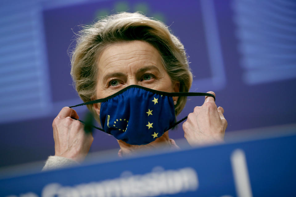 European Commission President Ursula von der Leyen puts on her protective face mask after addressing a media conference on Brexit negotiations at EU headquarters in Brussels, Thursday, Dec. 24, 2020. (AP Photo/Francisco Seco, Pool)