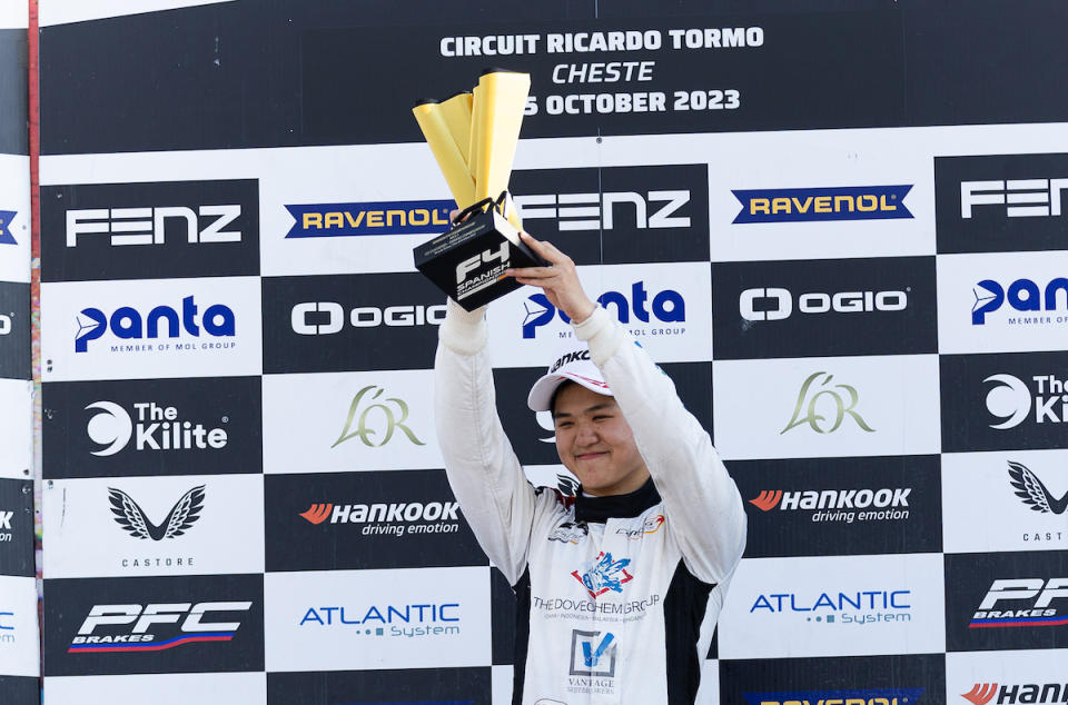 Singapore race driver Christian Ho holds aloft the trophy after winning in Valencia in the Spanish Formula 4 Championship. (PHOTO: Fotocar13)