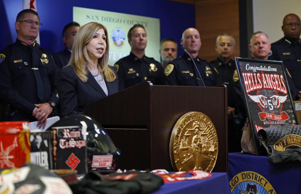 San Diego County District Attorney Summer Stephan announces grand jury indictments of 17 defendants at a news conference on Monday, Sept. 25, 2023, in San Diego, in connection with a violent attack against three Black men by members of the Hell's Angels biker gang in Ocean Beach earlier this year. (K.C. Alfred/The San Diego Union-Tribune via AP)