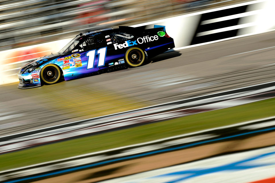 FORT WORTH, TX - NOVEMBER 05: Denny Hamlin, driver of the #11 FedEx Office Toyota, drives on track during practice for the NASCAR Sprint Cup Series AAA Texas 500 at Texas Motor Speedway on November 5, 2011 in Fort Worth, Texas. (Photo by Jared C. Tilton/Getty Images for NASCAR)