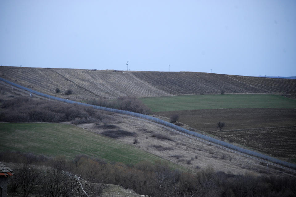 FILE - A wire border fence is nearby the village of Shtit in Bulgaria, near the border with Turkey on Saturday, Feb. 29, 2020. Border fences are back in vogue. Several were erected after well over one million migrants entered Europe in 2015, most of them refugees from Syria and Iraq. Countries sought EU money to help pay for them, but the commission declined, saying they're not in line with "European values." (AP Photo/Hristo Rusev, File)