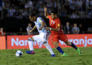 Football Soccer - Argentina v Chile - World Cup 2018 Qualifiers - Antonio Liberti Stadium, Buenos Aires, Argentina - 23/3/17 - Argentina's Gabriel Mercado (L) and Chile's Alexis Sanchez compete for the ball. REUTERS/Alberto Raggio