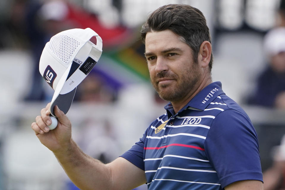 Louis Oosthuizen, of South Africa, tips his cap after finishing on the 18th green during the final round of the U.S. Open Golf Championship, Sunday, June 20, 2021, at Torrey Pines Golf Course in San Diego. (AP Photo/Jae C. Hong)