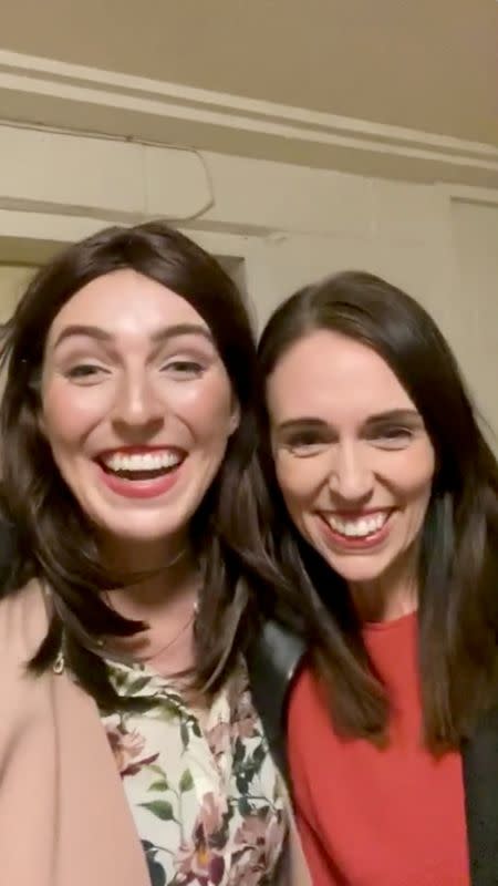 Melanie Bracewell, a NZ PM Jacinda Ardern impersonator, takes a selfie video with Ardern in this still photo taken from a video in Auckland