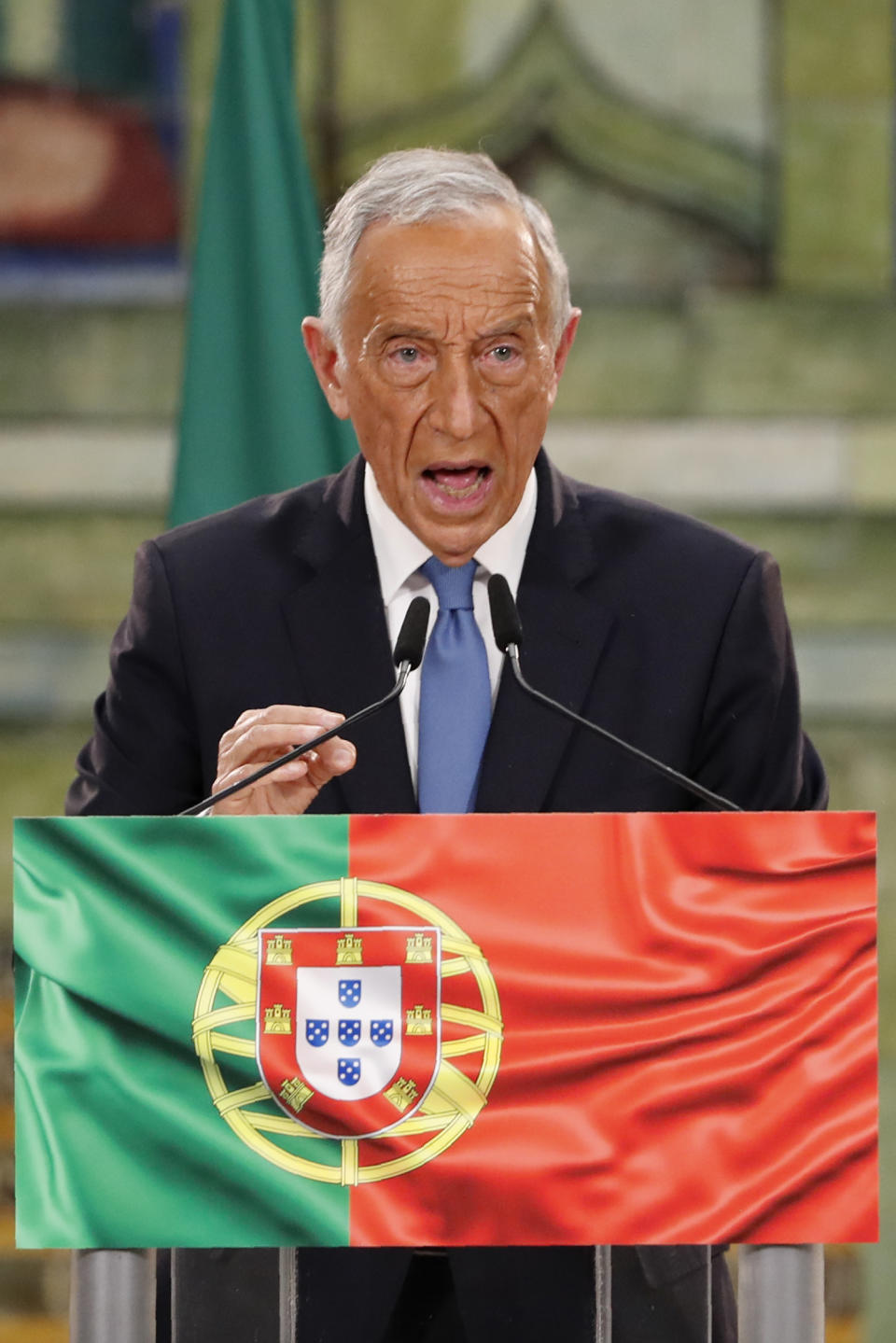Incumbent Marcelo Rebelo de Sousa delivers a speech following the results of Portugal's presidential election, in Lisbon, Monday, Jan. 25, 2021. Rebelo de Sousa was reelected for a second five-year term. (AP Photo/Armando Franca)