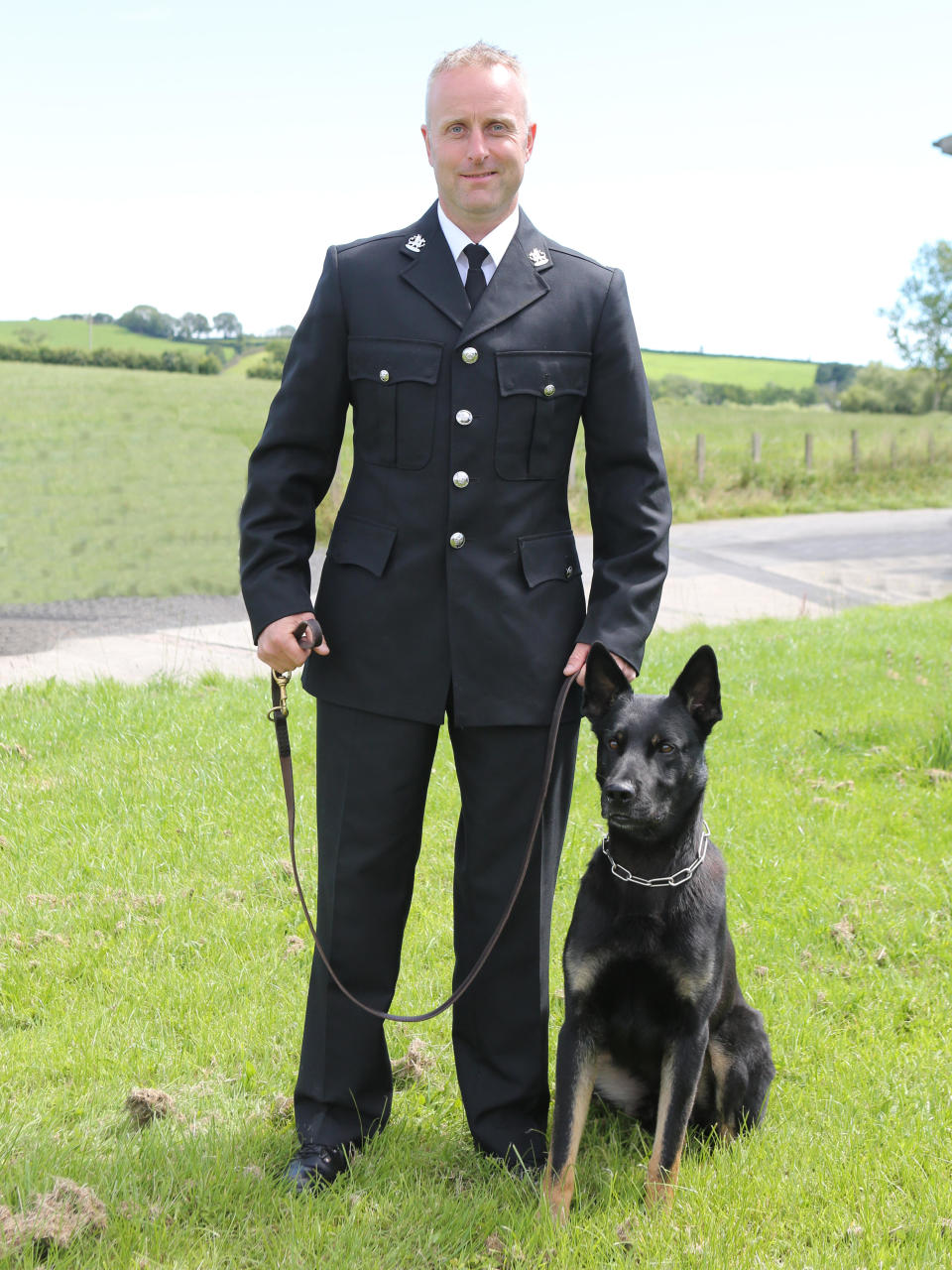 Max was leading his human handler on his first official day of work, when he discovered a missing mother and baby in a remote area of Powys, Wales. / Credit: Dyfed-Powys Police