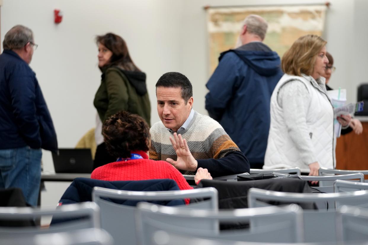 Bernie Moreno greets voters and candidates for other offices during a meeting of the Warren County GOP on Jan. 18.