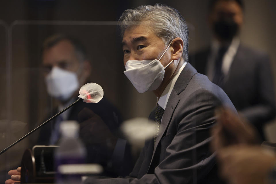 U.S. Special Representative for North Korea Sung Kim talks with South Korea's Special Representative for Korean Peninsula Peace and Security Affairs Noh Kyu-duk during their meeting at Plaza Hotel in Seoul Monday, Aug. 23, 2021. Kim is in Seoul for discussions over stalled nuclear diplomacy with Pyongyang. (Chung Sung-Jun/Pool Photo via AP)