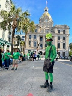 Lynn Davis is decked out in green. It took a couple years of experimenting with different paints to find the right one for the big day.