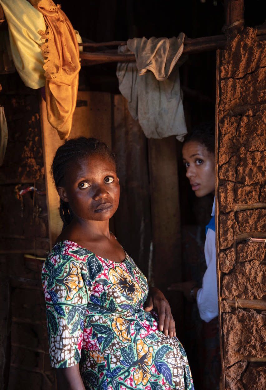 Kalehe, South Kivu, Democratic Republic of the Congo. UNHCR Goodwill Ambassador Gugu Mbatha-Raw visits a resettlement site in Kahele, Democratic Replublic of the Congo. Gugu meets with Cadette, pregnant with her seventh child, inside her home in a resettlement site in Kahele. She lives here in a small house with two rooms with her six children, her grandmother, and her seven siblings who she looks after too. She lost her parents a long time ago. One of the many difficult choices she has to make is between food and patching up her house. She has chosen food. Cadette, along with all the residents of this site, are here because of their village, a four hour walk away, flooded when a river burst its banks. ; The Democratic Republic of the Congo hosts one of the most complex humanitarian crises in the world, with 520,000 refugees and asylum-seekers and 5.6 million Internally Displaced Persons (IDPs), the largest internal displacement crisis in Africa. In addition, more than 1 million Congolese refugees and asylum-seekers are sheltered across the African continent. Around 76% of the population live in poverty and 27 million people are food insecure. For such a dire and long-running crisis, the humanitarian response is severely underfunded, at only 33% of the $225 million in UNHCR’s needs-based budget, as of the end of August 2022. Some of these costs could be avoided in future if there were funds now to help refugees in the country, and Congolese refugees outside the country, to return to their place of origin. For IDPs, underfunding has put protection (including women’s empowerment) and shelter (sustainable housing and settlements) at critical risk. Currently, only 33% of the operations in DRC are funded, with a $151 million funding gap.