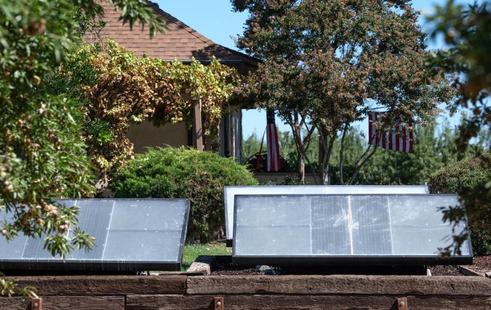 Hydropanels, which trap water vapor from the air, are being used in a pilot program to make safe drinking water at a home in Stanislaus County with high levels of nitrates in its well water. Photographed in Keyes, Calif., on Wednesday, August 3, 2022.