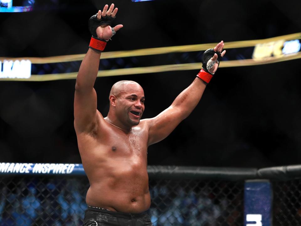 Daniel Cormier celebrates his victory over Volkan Oezdemir: Getty