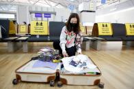 Kim Ji-eun, BTS fan, checks her luggage at the Incheon International Airport