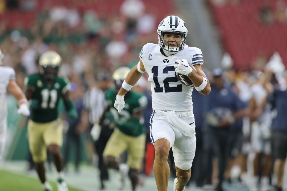 BYU wide receiver Puka Nacua scores on BYU’s first play from scrimmage in BYU’s 2022 season opener against USF.