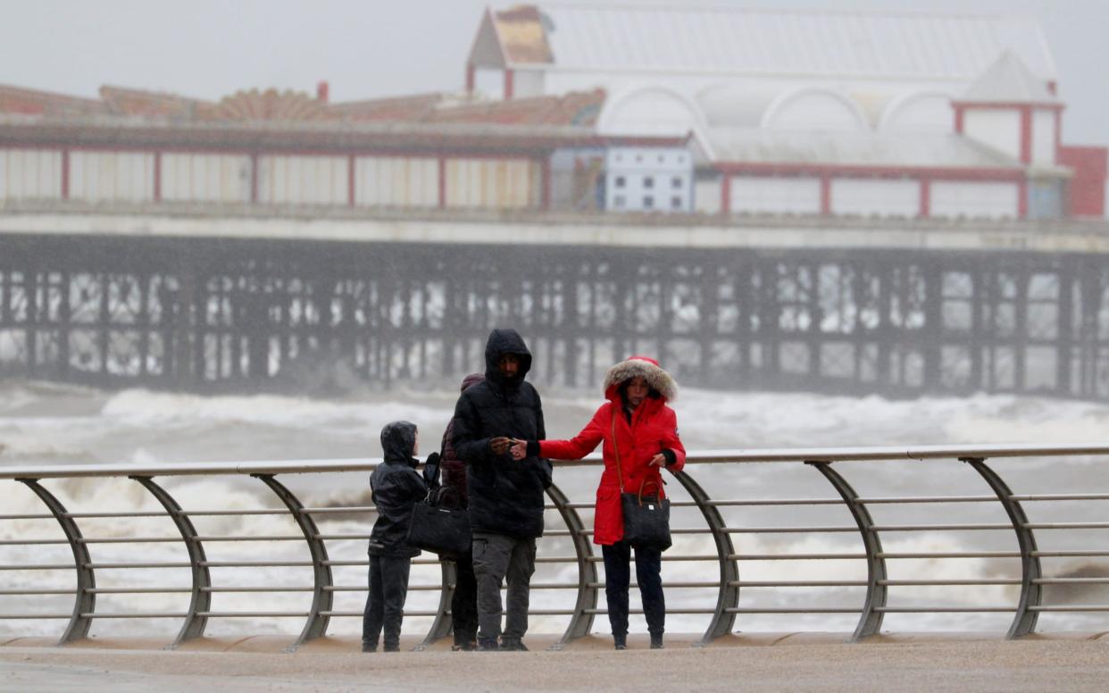 Residents in Blackpool brave the heavy wind and rain - Phil Taylor /SWNS