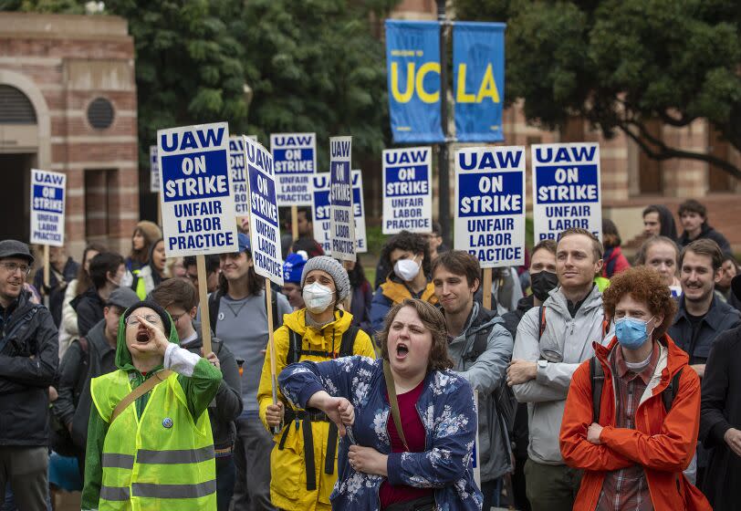 LOS ANGELES, CA-DECEMBER 2, 2022: Graduate student workers on strike at UCLA, are joined by faculty members in support of them during a rally on campus, calling for the university to offer the students a contract with a dramatic increase in pay and benefits to match the skyrocketing cost of living in California. (Mel Melcon / Los Angeles Times)