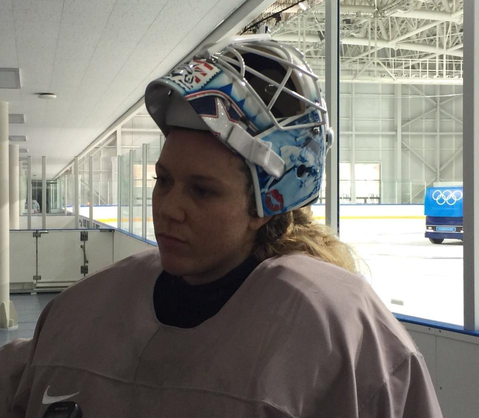 Alex Rigsby has a new mask for the Olympics that features a drawing of the famous V-J Day kiss. (Eric Adelson)