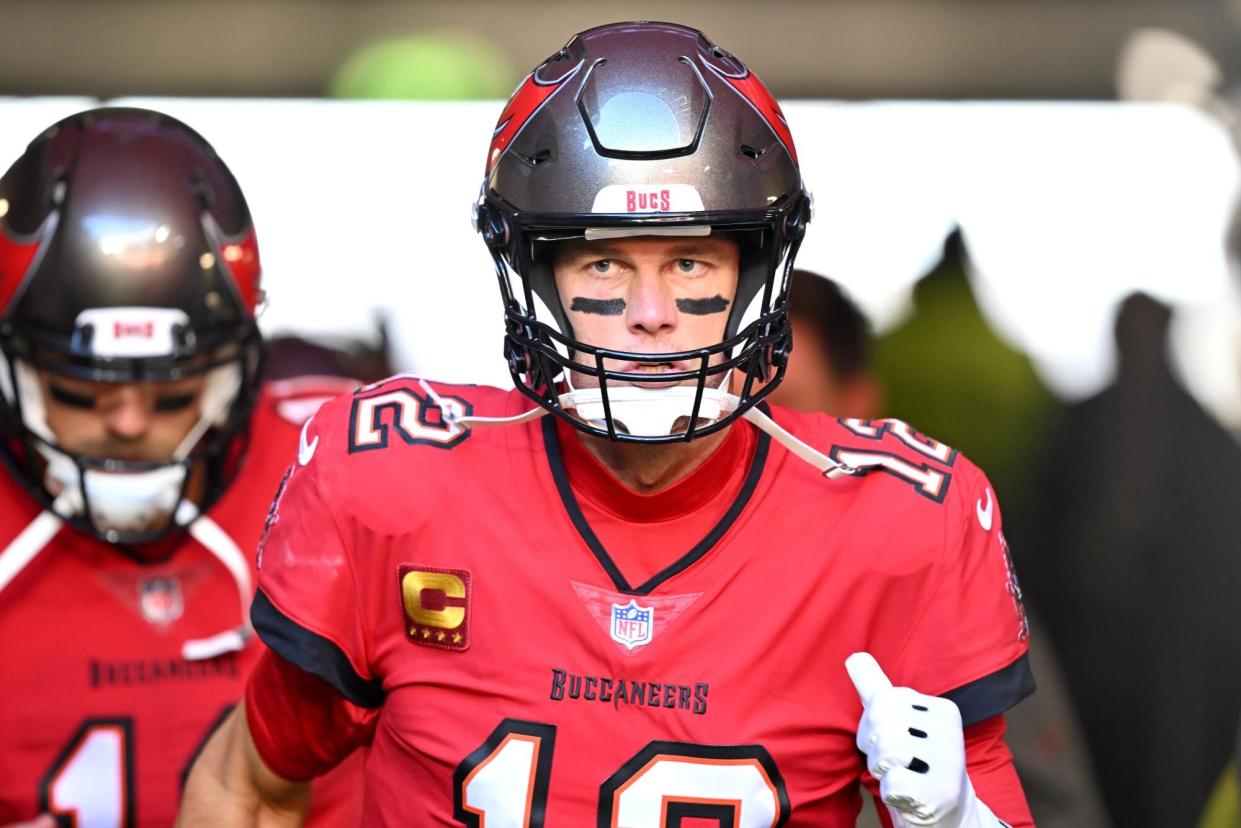 MUNICH, GERMANY - NOVEMBER 13: Tom Brady #12 of the Tampa Bay Buccaneers takes to the field prior to kick off of the NFL match between Seattle Seahawks and Tampa Bay Buccaneers at Allianz Arena on November 13, 2022 in Munich, Germany. (Photo by Sebastian Widmann/Getty Images)