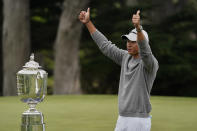 Collin Morikawa poses with the Wanamaker Trophy after winning the PGA Championship golf tournament at TPC Harding Park Sunday, Aug. 9, 2020, in San Francisco. (AP Photo/Charlie Riedel)
